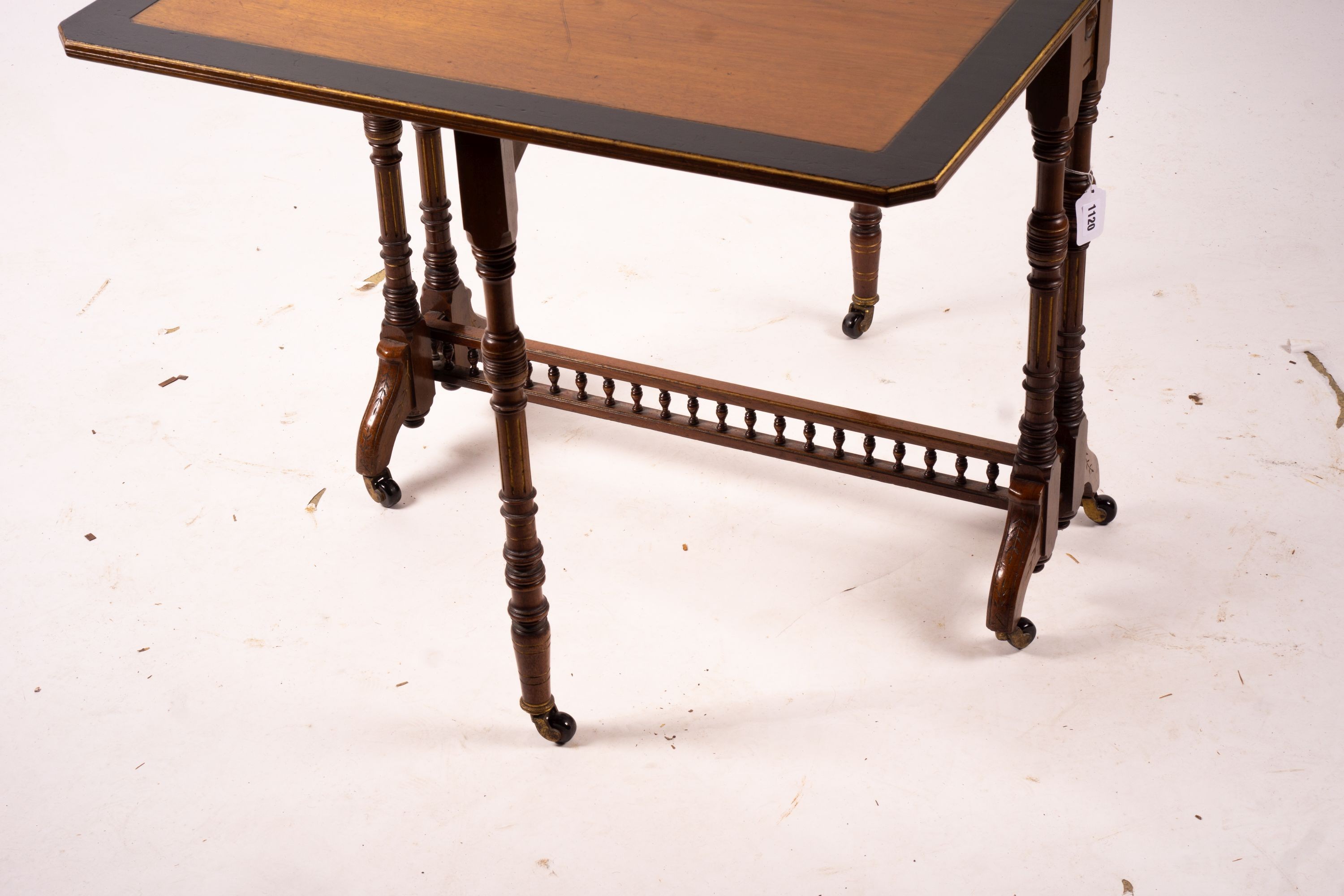 A late Victorian part ebonised walnut Sutherland table, width 76cm, depth 15cm, height 65cm